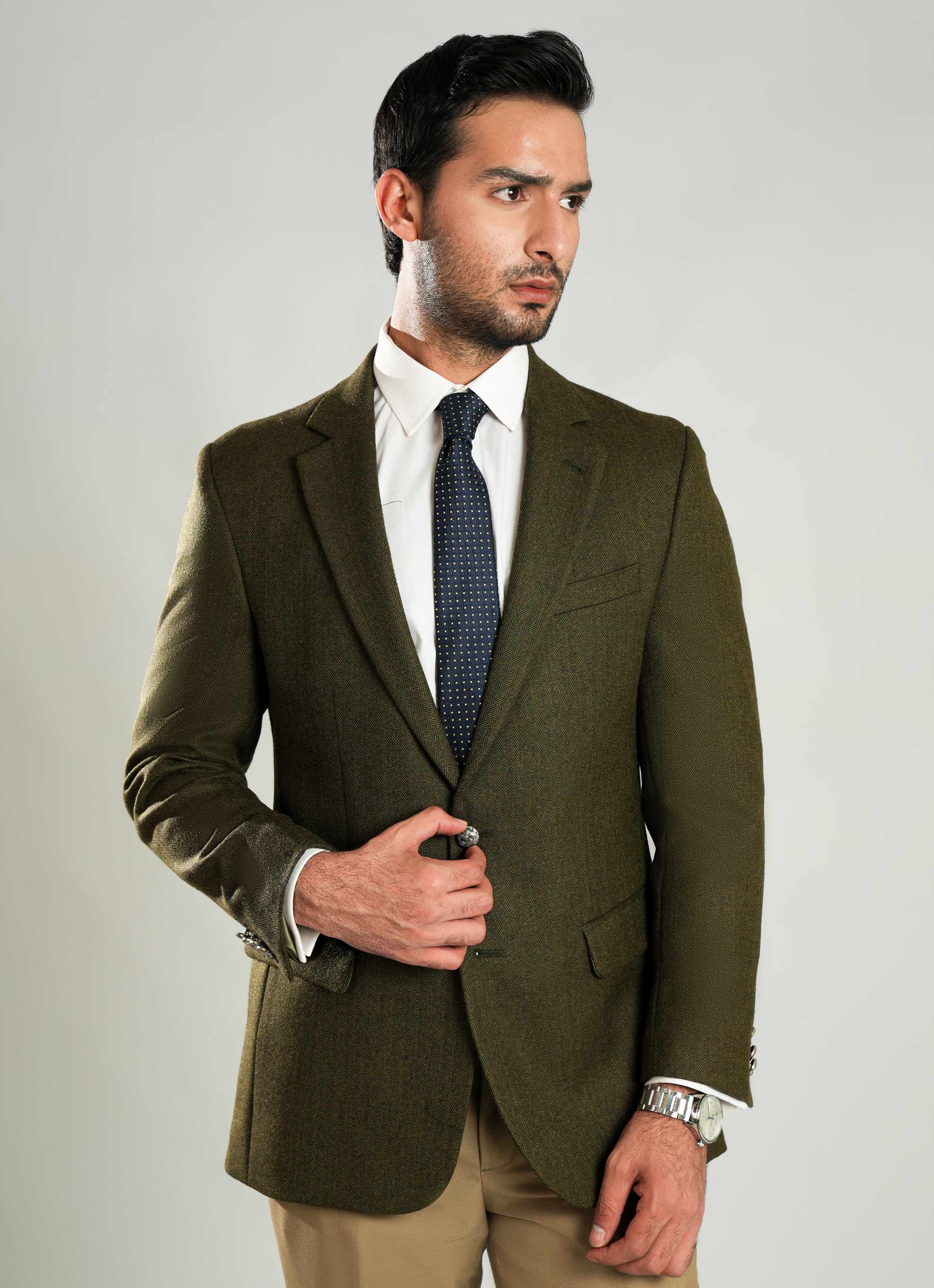 Lawrencepur cedar herringbone worsted tweed blazer for a warm and stylish look. Main image