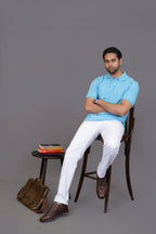 Back shoulder detail of sky blue polo shirt